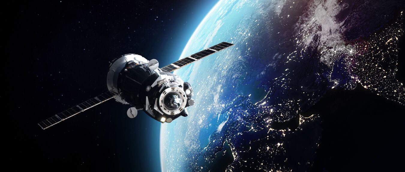 Satellite orbiting above Earth.