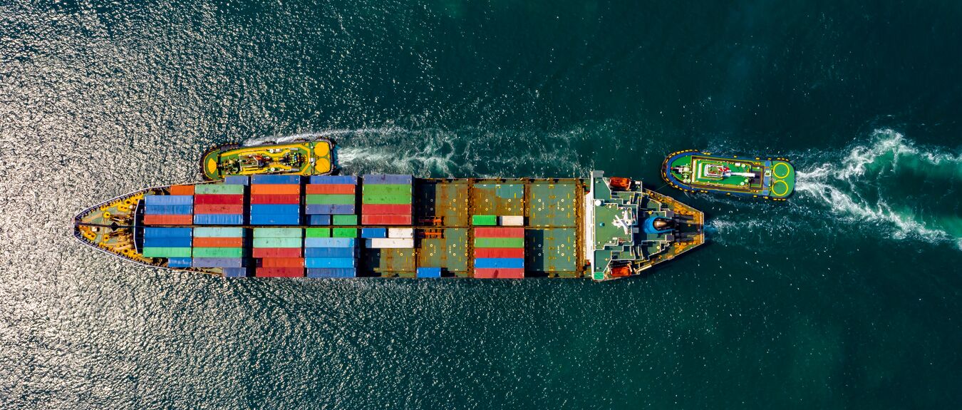 Aerial view of International Containers Cargos ship,Freight Transportation, Shipping,Trade Port,Shipping cargo to harbor, Nautical Vessel.Logistics import export Container Cargo ship over sea business